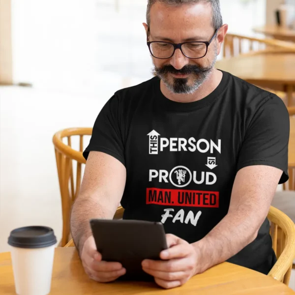 t-shirt-mockup-featuring-a-man-reading-at-a-cafe-31712 Manchester United T-shirt